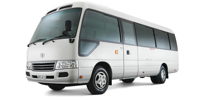 Image of Coaster bus car model, BookMe Car Rental Service, New Car Models Available for Rent, Affordable Prices.